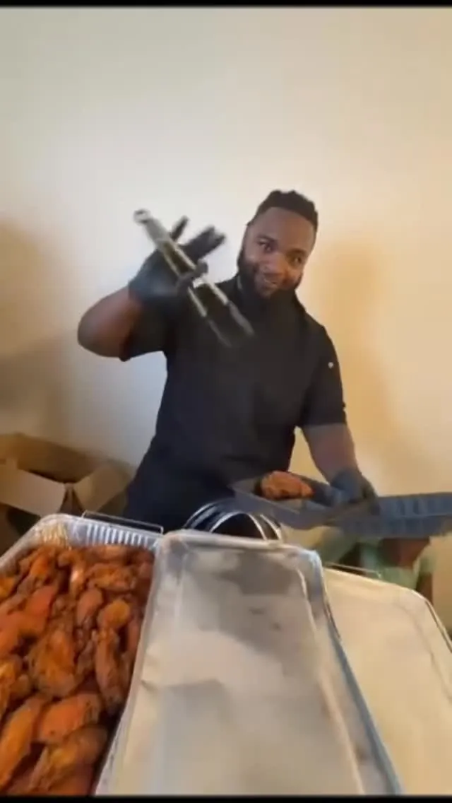JB serving up trays of wings