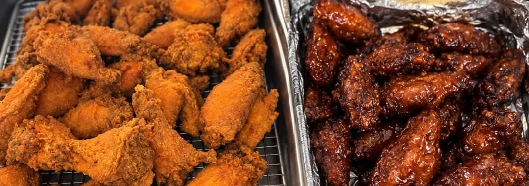 Trays of regular fried and honey garlic wings